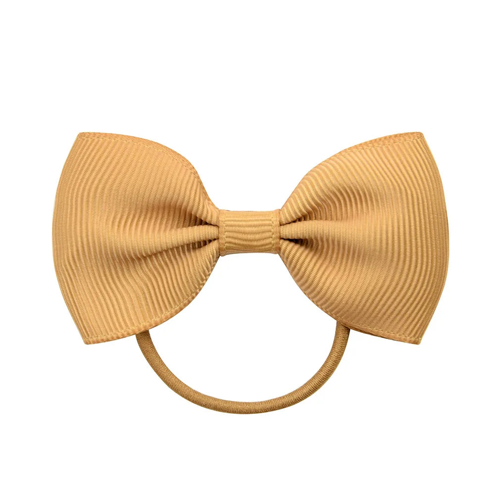 1 Pcs Fashion Small Baby Elastic Rubber Band Head Rope Mini Solid Ribbow Bow Tie